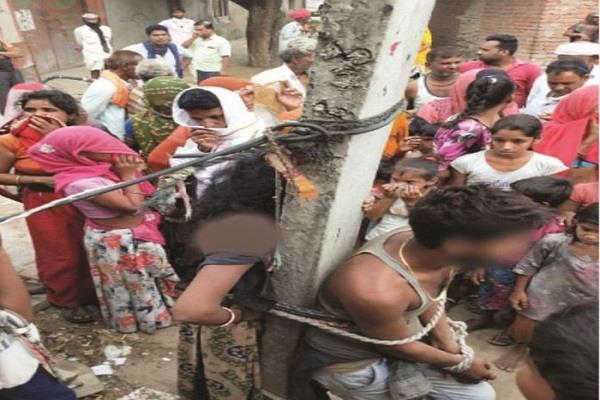 इंसानियत को शर्मसार करने वाली तस्वीर, विधवा महिला और युवक को घंटों बिजली के खंभे पर बांधकर की पिटाई