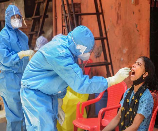 भारत में कोरोना वायरस की मंद हो रही रफ्तार, 24 घंटों में सिर्फ 26,567 नए मामले