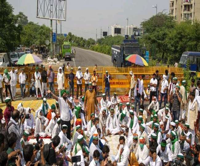 Farmers Protest : गतिरोध तोड़ने के लिए लंबे वक्त के लिए ठंडे बस्ते में जा सकते हैं नए कृषि कानून