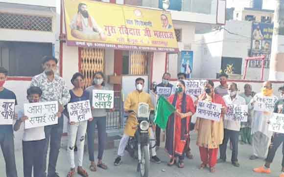 बाइक रैली निकालकर लोगों को किया कोरोना के प्रति जागरूक