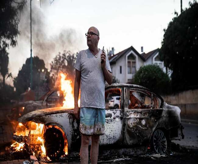Israeli–Palestinian conflict: इजरायल के कुछ शहरों में भड़के दंगे, गाजा में 83 की मौत, जानें- हमास के हमले का कारण