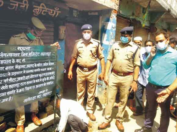 पुलिस व राजस्व टीम ने की गैंगस्टर की सम्पत्ति कुर्क