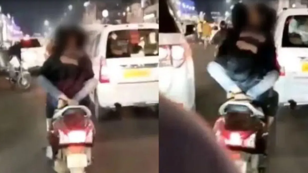 लखनऊ में बीच सड़क स्कूटी सवार युवक-युवती कर रहे थे रोमांस, पुलिस ने युवक को पकड़ा